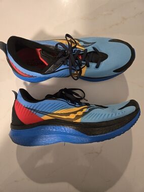 Saucony Womans Blue Sneakers with Yellow and Red Accents